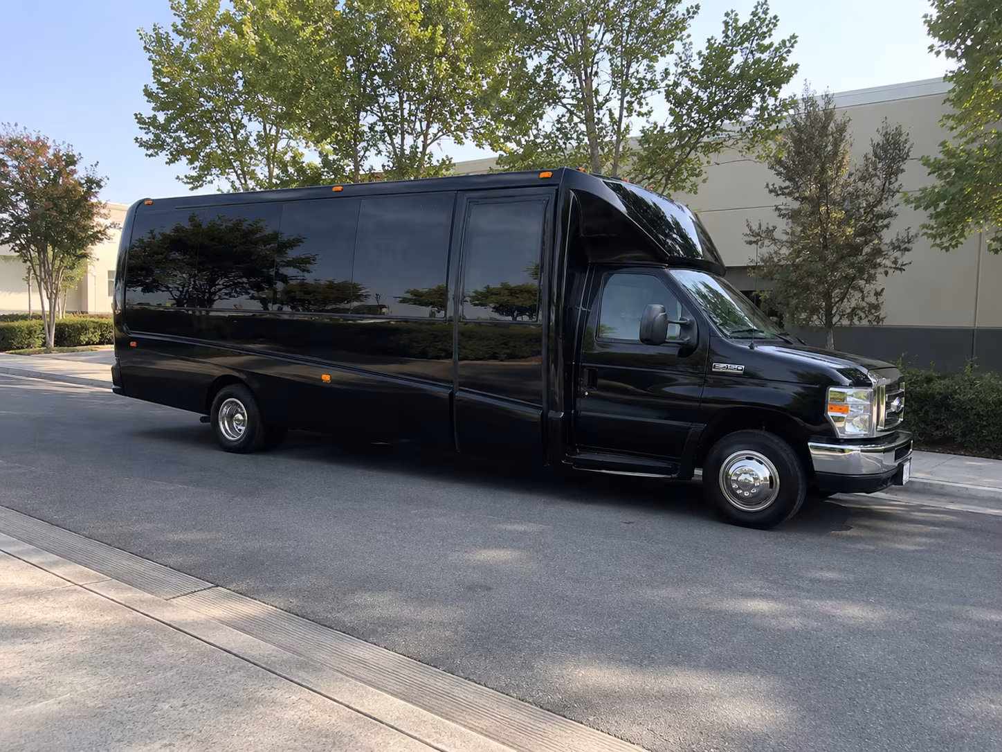 Wedding guests seated inside a Allen party bus